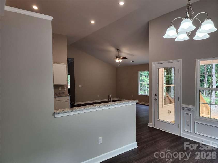 5900 Flamingo Drive, Conover, NC 28613.  MLS# CAR4415177, YatesRealty ID 34158. Vaulted - Dining, Kitchen, Living Open Floor Plan