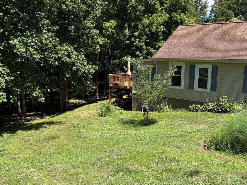 125 Lane Street, Morganton, NC 28655.  MLS# CAR4395531, YatesRealty ID 34159. Side of the home. Side yard.