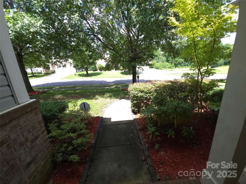 5933 Kirkwynd Commons Drive, Charlotte, NC 28278.  MLS# CAR4291416, YatesRealty ID 34162. Another front yard view.