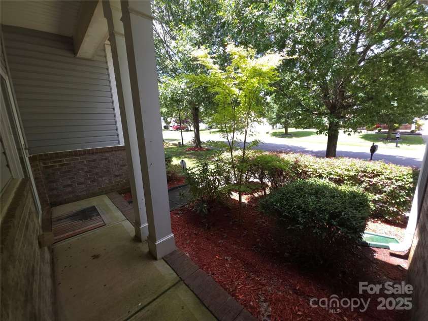 5933 Kirkwynd Commons Drive, Charlotte, NC 28278.  MLS# CAR4291416, YatesRealty ID 34162. Front yard view from the front porch.