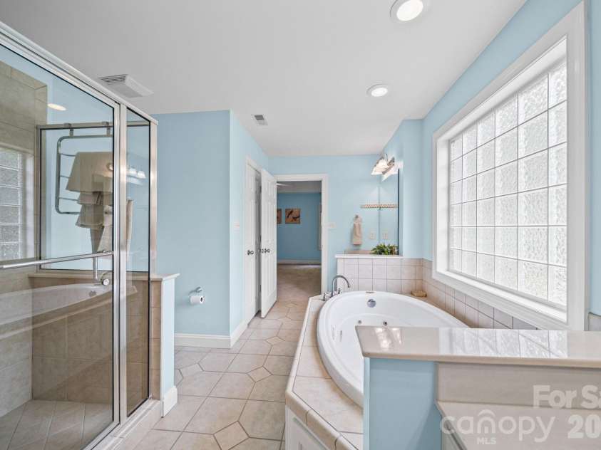 1042 Marguerite Drive, Lowell, NC 28098.  MLS# CAR4397338, YatesRealty ID 34172. Primary Bath