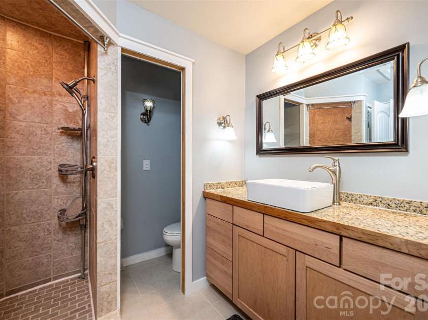 233 Eastside Drive, Statesville, NC 28625.  MLS# CAR4397585, YatesRealty ID 34174. Primary bath