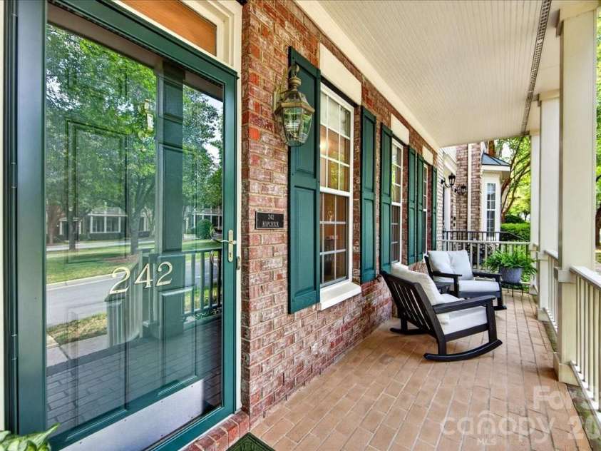 242 Faulkner Way, Davidson, NC 28036.  MLS# CAR4395516, YatesRealty ID 34179. Enjoy covered, brick front porch