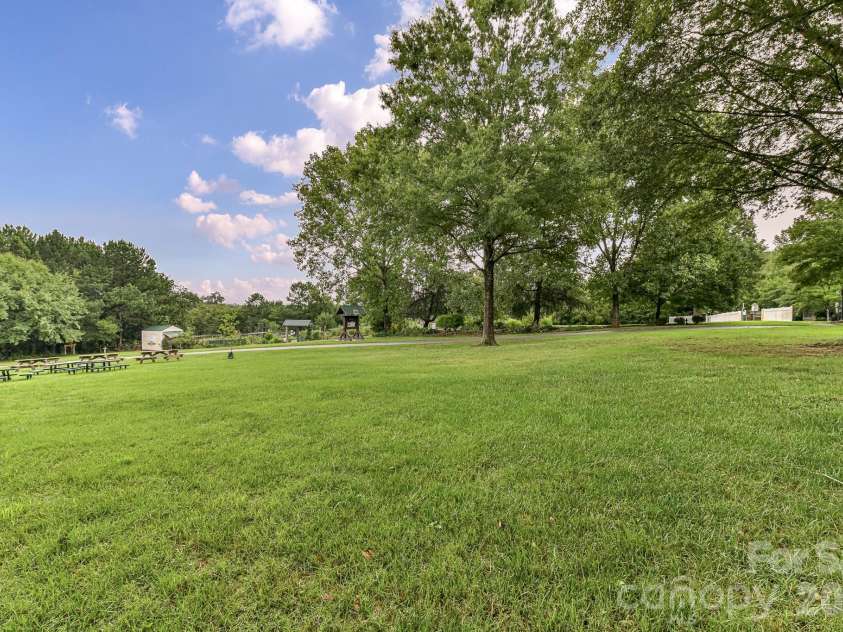 242 Faulkner Way, Davidson, NC 28036.  MLS# CAR4395516, YatesRealty ID 34179. St. Alban’s green space