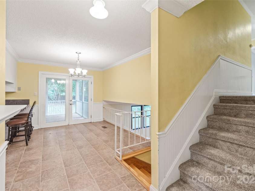 43 Bowen Drive, Belmont, NC 28012.  MLS# CAR4274068, YatesRealty ID 34179. Breakfast Area,  Breakfast Bar and stairs to upper level