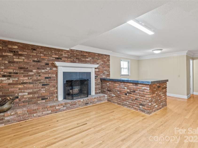 43 Bowen Drive, Belmont, NC 28012.  MLS# CAR4274068, YatesRealty ID 34179. Imagine cozying up to this warm fireplace
