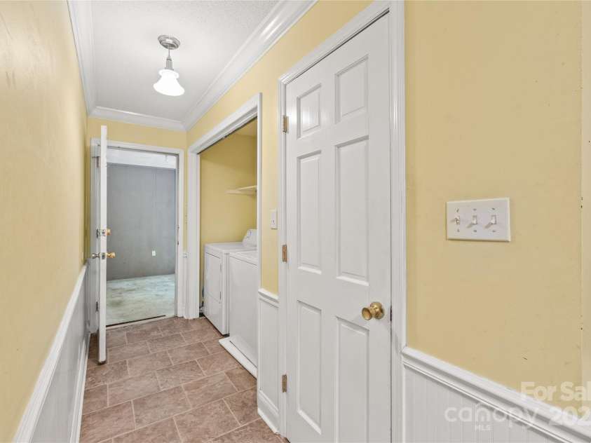 43 Bowen Drive, Belmont, NC 28012.  MLS# CAR4274068, YatesRealty ID 34179. Laundry Closet and Door to Garage