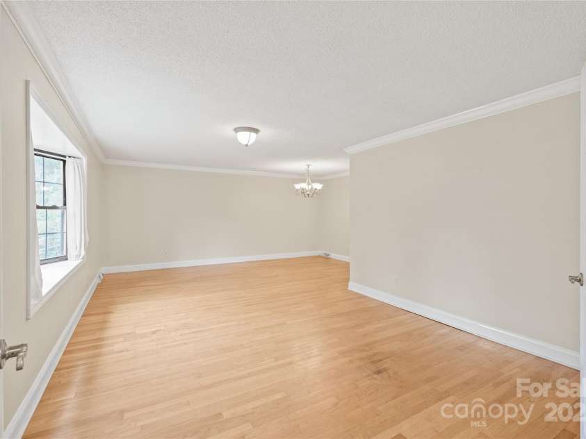 43 Bowen Drive, Belmont, NC 28012.  MLS# CAR4274068, YatesRealty ID 34179. Living Room with French Doors