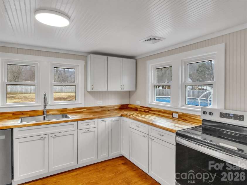 106 Long Street, Waynesville, NC 28786.  MLS# CAR4340729, YatesRealty ID 3418. Butcher Block Countertops