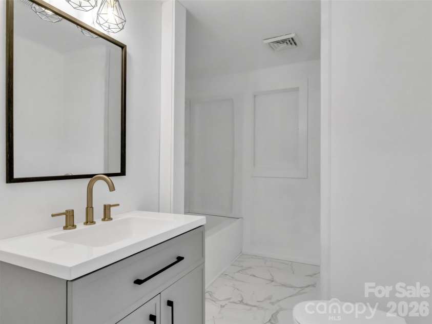 106 Long Street, Waynesville, NC 28786.  MLS# CAR4340729, YatesRealty ID 3418. Remodeled Bath