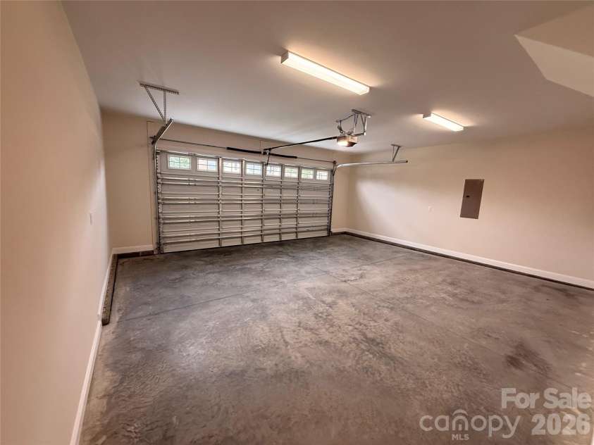 105 Abbington Lane, Shelby, NC 28150.  MLS# CAR4380591, YatesRealty ID 34185. The two-car garage is completely finished.