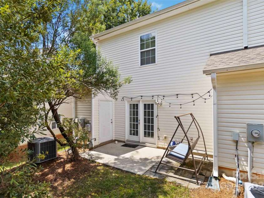 8437 Big Creek Court, Matthews, NC 28105.  MLS# CAR4287368, YatesRealty ID 34185. Storage unit outside is convenient.