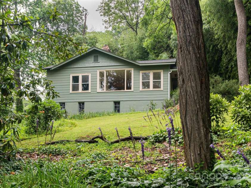 56 Lockley Avenue, Asheville, NC 28804.  MLS# CAR4294386, YatesRealty ID 34186. Home sits back off a private dead-end street