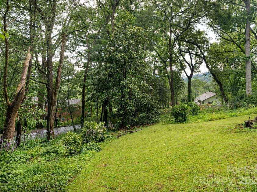 56 Lockley Avenue, Asheville, NC 28804.  MLS# CAR4294386, YatesRealty ID 34186. Large open Lot