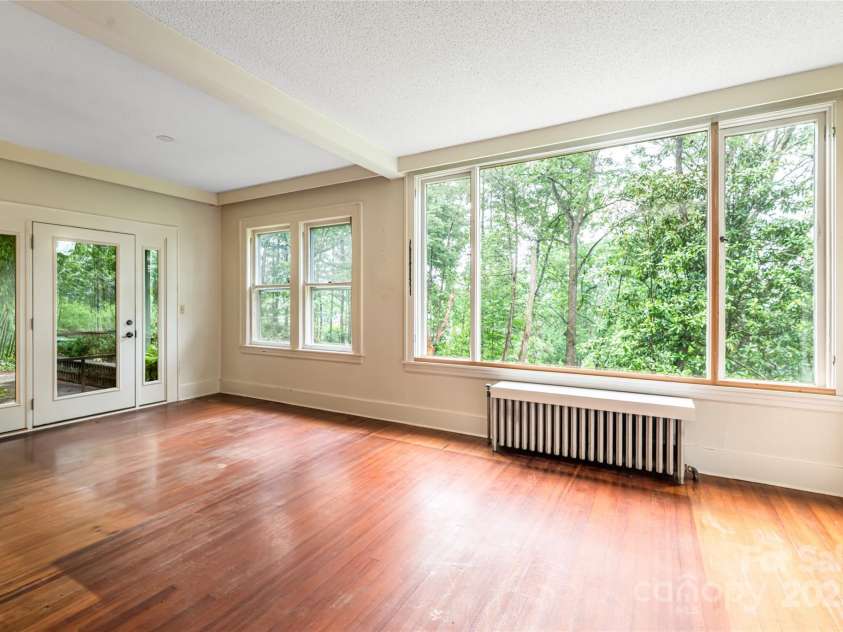 56 Lockley Avenue, Asheville, NC 28804.  MLS# CAR4294386, YatesRealty ID 34186. Large windows throughout the home