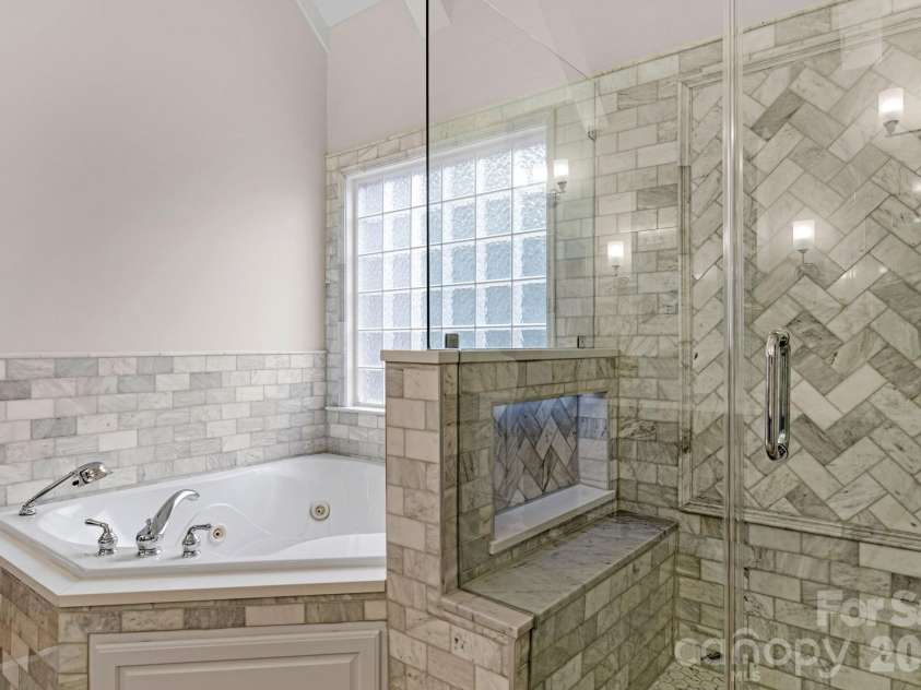 1913 Abbotts Creek Road, Waxhaw, NC 28173.  MLS# CAR4340670, YatesRealty ID 3419. Marble tile and lighted niche