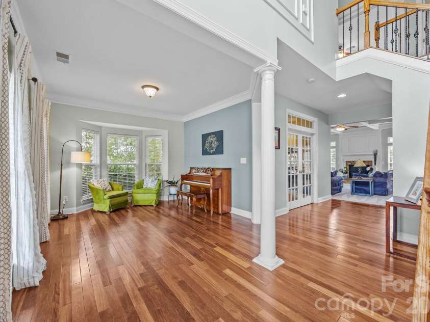 7321 Waterwheel Street, Concord, NC 28025.  MLS# CAR4342444, YatesRealty ID 34192. Living.Room, pristine wood floors