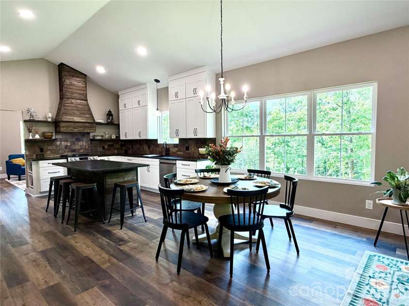 128 Arrowood Lane, Harmony, NC 28634.  MLS# CAR4385564, YatesRealty ID 34193. Kitchen and dining area
