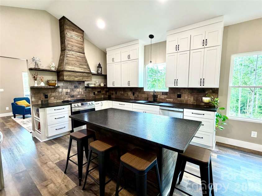128 Arrowood Lane, Harmony, NC 28634.  MLS# CAR4385564, YatesRealty ID 34193. Kitchen with island
