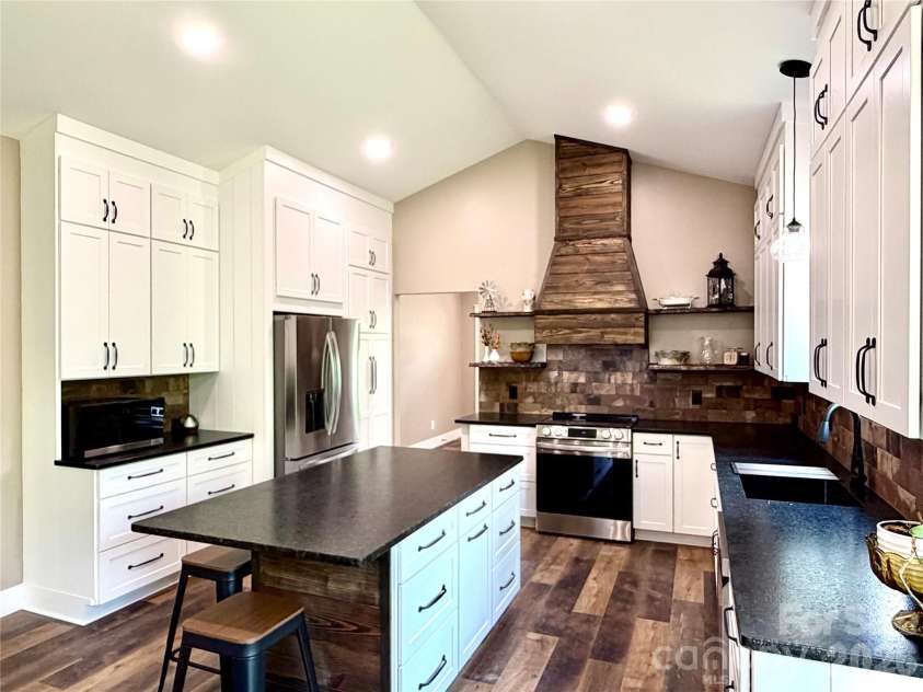 128 Arrowood Lane, Harmony, NC 28634.  MLS# CAR4385564, YatesRealty ID 34193. Kitchen with island