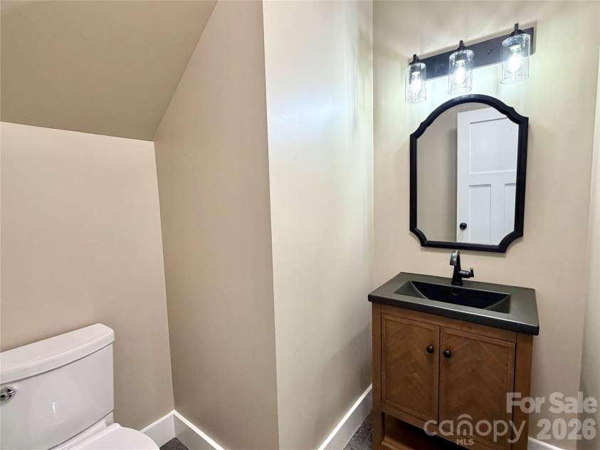 128 Arrowood Lane, Harmony, NC 28634.  MLS# CAR4385564, YatesRealty ID 34193. Powder room