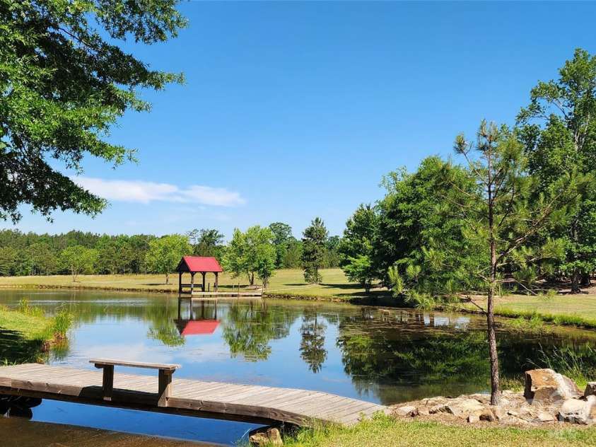 4859 Camp Creek Road, Lancaster, SC 29720.  MLS# CAR4386859, YatesRealty ID 34197. Over 1 acre pond 