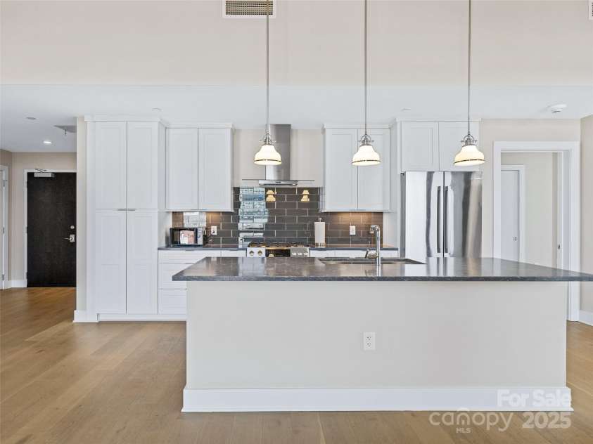 145 Biltmore Avenue, Asheville, NC 28801.  MLS# CAR4331069, YatesRealty ID 342. Beautiful quartz countertops