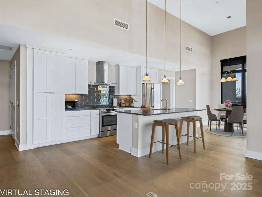 145 Biltmore Avenue, Asheville, NC 28801.  MLS# CAR4331069, YatesRealty ID 342. Imagine friends and family here