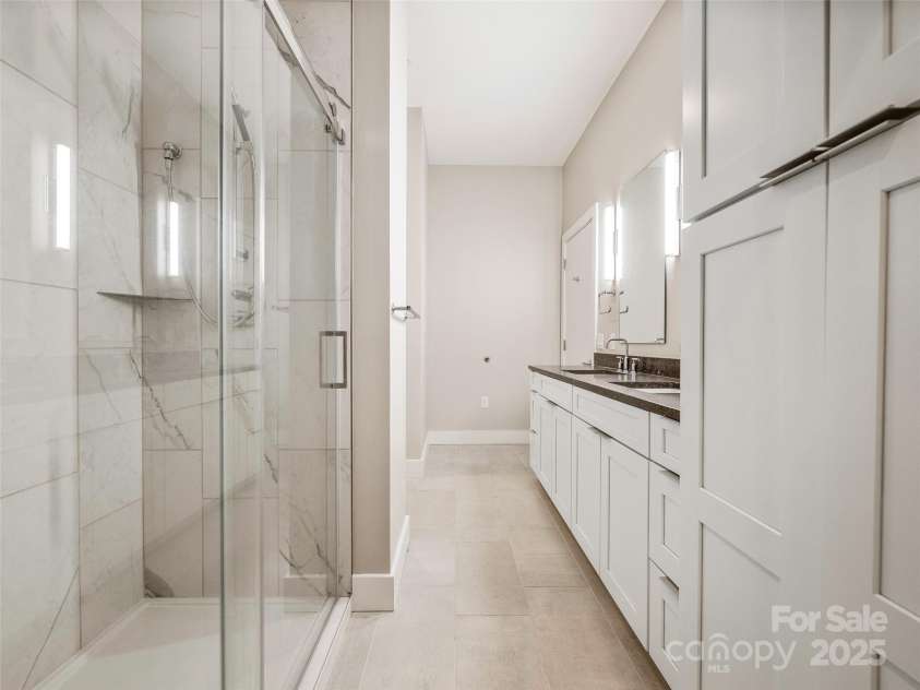 145 Biltmore Avenue, Asheville, NC 28801.  MLS# CAR4331069, YatesRealty ID 342. Luxury spa primary bath