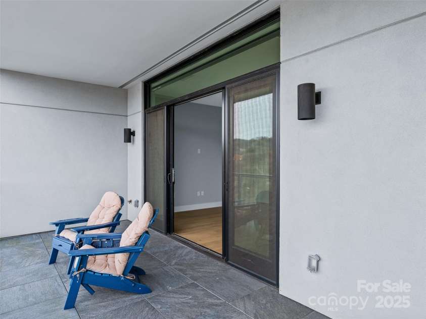 145 Biltmore Avenue, Asheville, NC 28801.  MLS# CAR4331069, YatesRealty ID 342. Slate tile on this large balcony