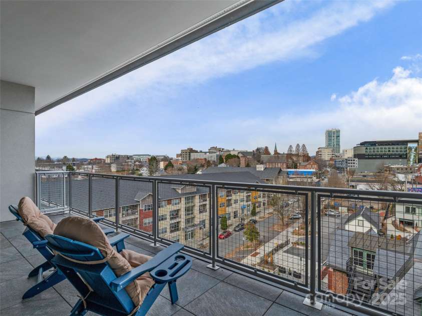 145 Biltmore Avenue, Asheville, NC 28801.  MLS# CAR4331069, YatesRealty ID 342. Unobstructed, long range views from this large primary balcony