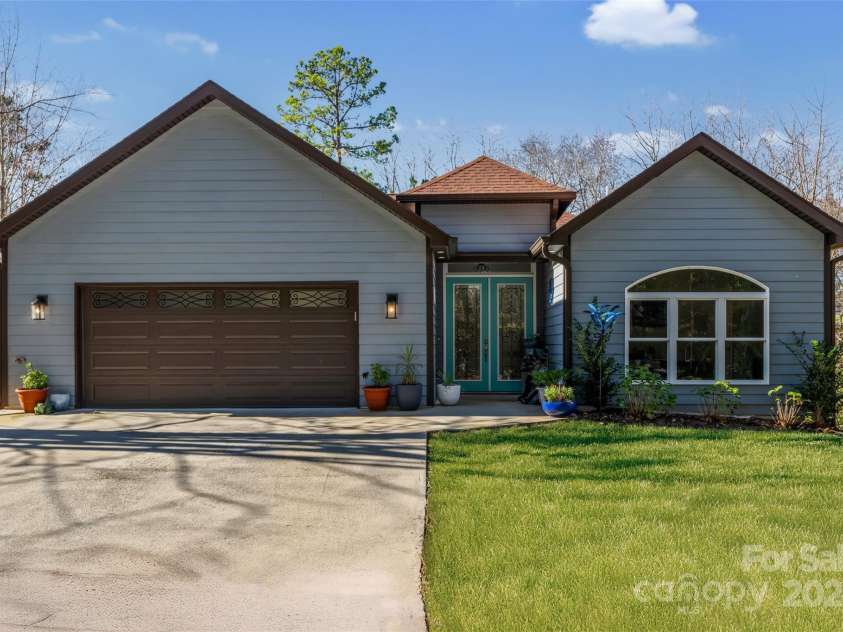 13 Roberts Street, Weaverville, NC 28787.  MLS# CAR4202654, YatesRealty ID 3420. Custom Built Like New Home