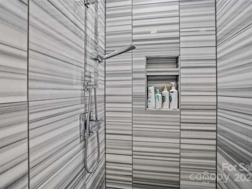 13 Roberts Street, Weaverville, NC 28787.  MLS# CAR4202654, YatesRealty ID 3420. Custom Tiled Shower in the En Suite Bath