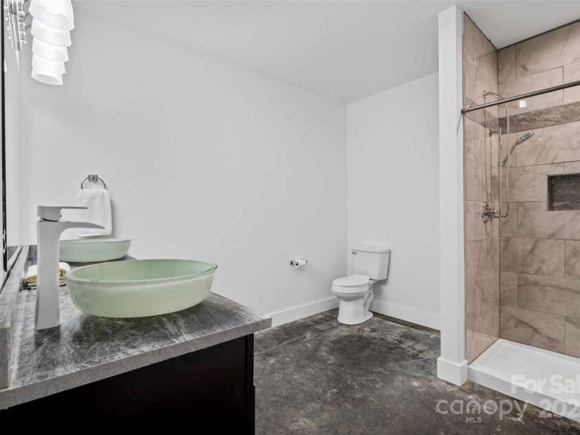 13 Roberts Street, Weaverville, NC 28787.  MLS# CAR4202654, YatesRealty ID 3420. Full Bath in Basement