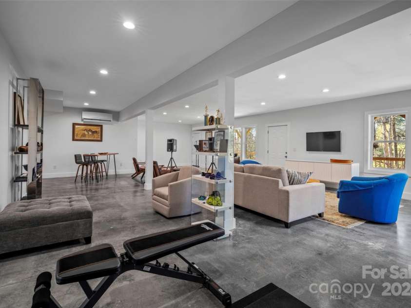 13 Roberts Street, Weaverville, NC 28787.  MLS# CAR4202654, YatesRealty ID 3420. Versatile Space in the Basement