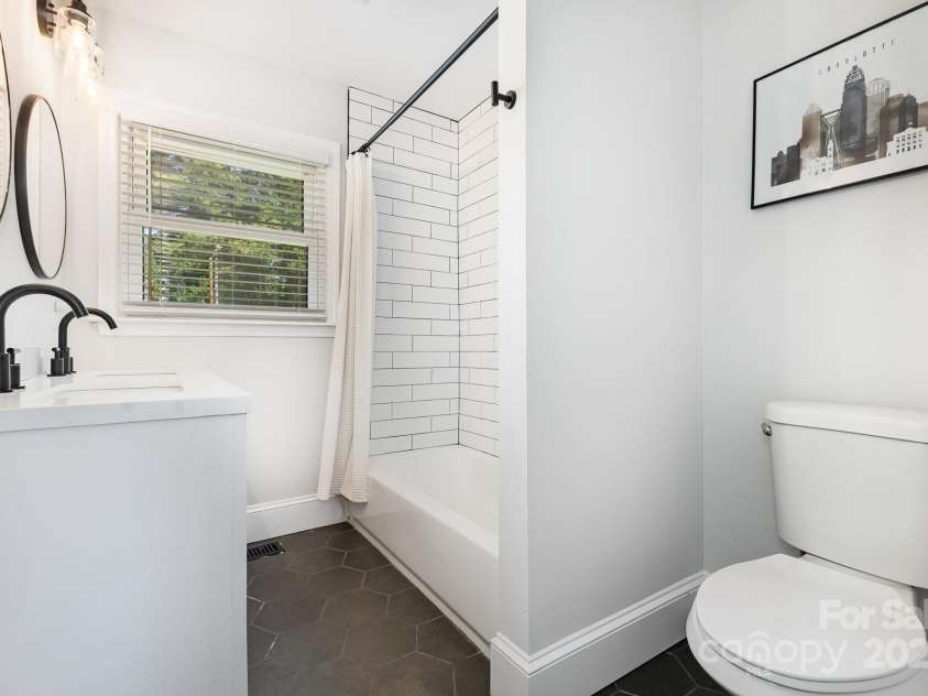 3615 Kempton Place, Charlotte, NC 28208.  MLS# CAR4262942, YatesRealty ID 34200. Beautifully renovated full bathroom.