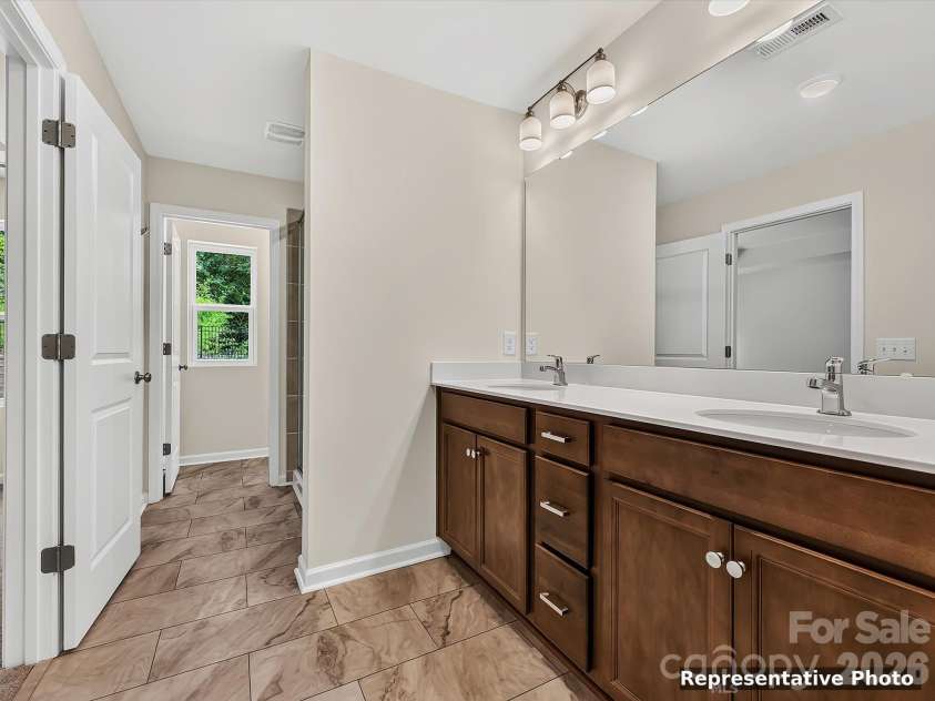 6067 White Aster Lane, Charlotte, NC 28216.  MLS# CAR4398357, YatesRealty ID 34200. 
