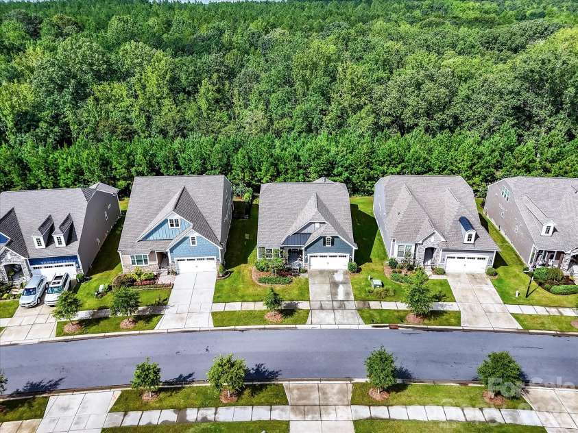 1733 Tranquility Boulevard, Lancaster, SC 29720.  MLS# CAR4393535, YatesRealty ID 34204. Drone View of Home backing to Common Area