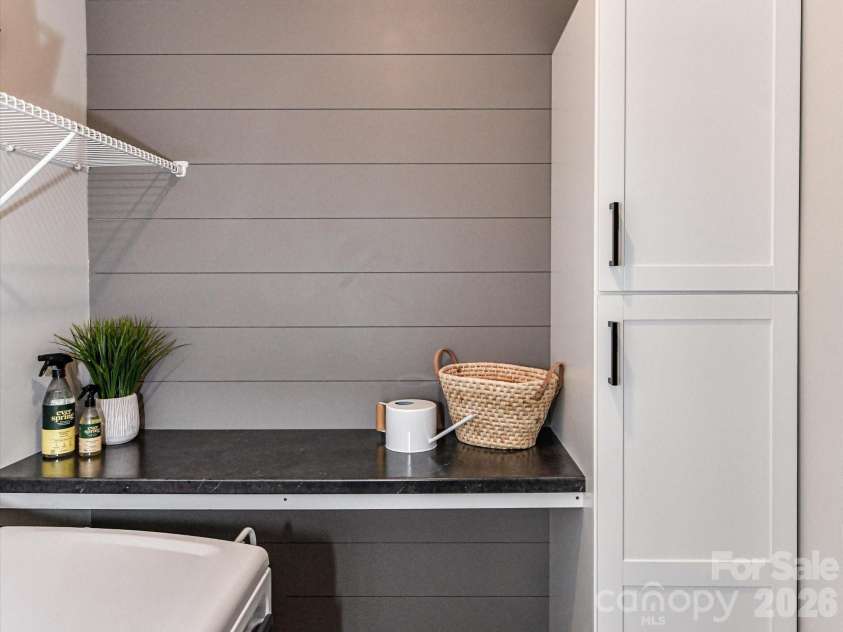 1733 Tranquility Boulevard, Lancaster, SC 29720.  MLS# CAR4393535, YatesRealty ID 34204. Laundry Shelf and Storage Cabinet
