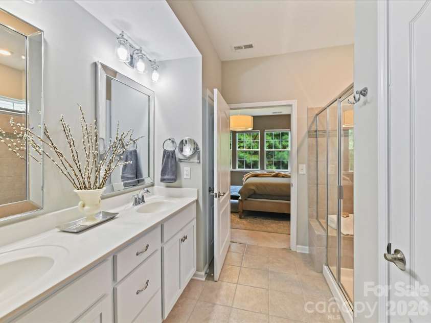 1733 Tranquility Boulevard, Lancaster, SC 29720.  MLS# CAR4393535, YatesRealty ID 34204. Primary Bath with Dual Sinks and Framed Mirrors