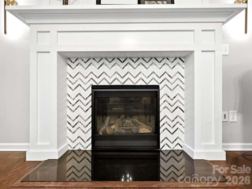 1733 Tranquility Boulevard, Lancaster, SC 29720.  MLS# CAR4393535, YatesRealty ID 34204. The original Fireplace was removed New Customized Fireplace Added. Custom Wood Surround, Wider Mantle, and Designer Tile around the Fireplace