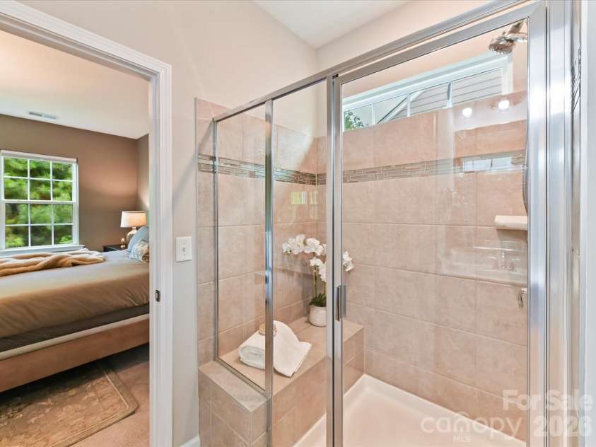 1733 Tranquility Boulevard, Lancaster, SC 29720.  MLS# CAR4393535, YatesRealty ID 34204. Tiled Surround in Walk in Shower with Bench Seat