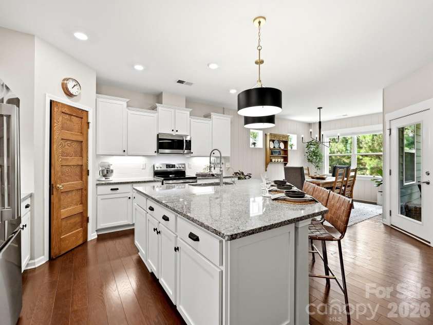 1733 Tranquility Boulevard, Lancaster, SC 29720.  MLS# CAR4393535, YatesRealty ID 34204. Wide Plank Flooring, Subway Tiled Backsplash, Under Counter Lighting, Granite Counters