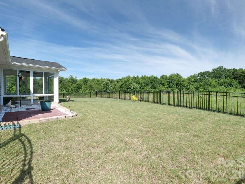 254 Damask Drive, Lancaster, SC 29720.  MLS# CAR4398403, YatesRealty ID 34208. Fully Fenced Backyard Open to Greenery