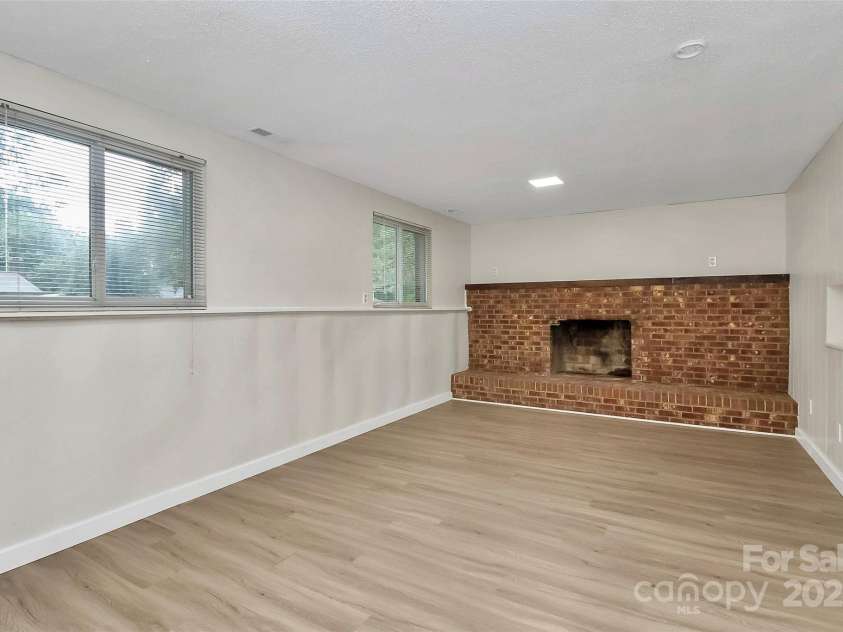 6230 Holly Knoll Drive, Charlotte, NC 28227.  MLS# CAR4291966, YatesRealty ID 34209. Lower Level Den