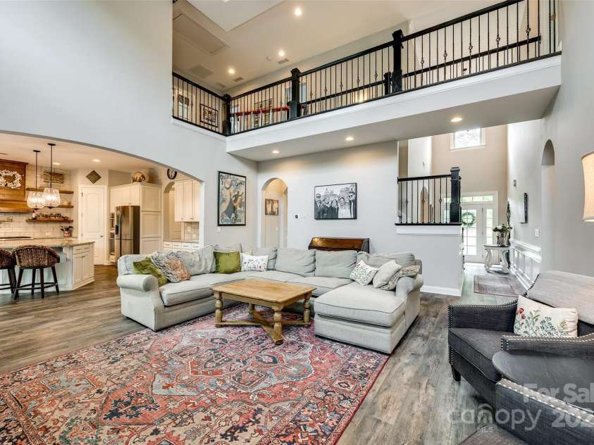 288 Ridge Reserve Drive, Lake Wylie, SC 29710.  MLS# CAR4249323, YatesRealty ID 34210. Spacious and light-filled, this stunning two-story great room offers an open flow to the kitchen, rich architectural detail, and the perfect blend of comfort and style.