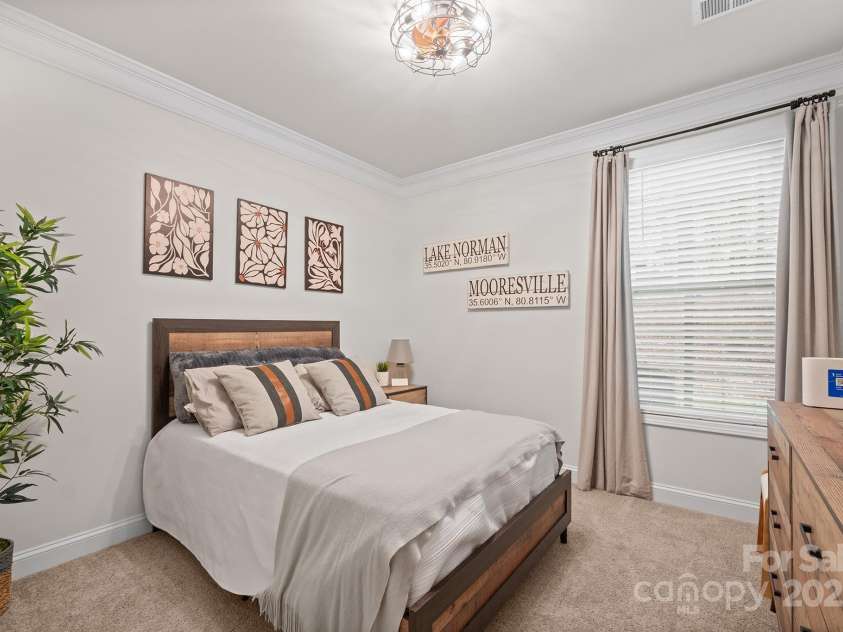 110 Callandor Court, Troutman, NC 28166.  MLS# CAR4293175, YatesRealty ID 34216. Main level guest bedroom