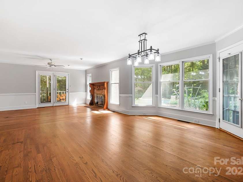 9921 Hanging Moss Trail, Mint Hill, NC 28227.  MLS# CAR4293455, YatesRealty ID 34217. Breakfast nook and family room with fireplace