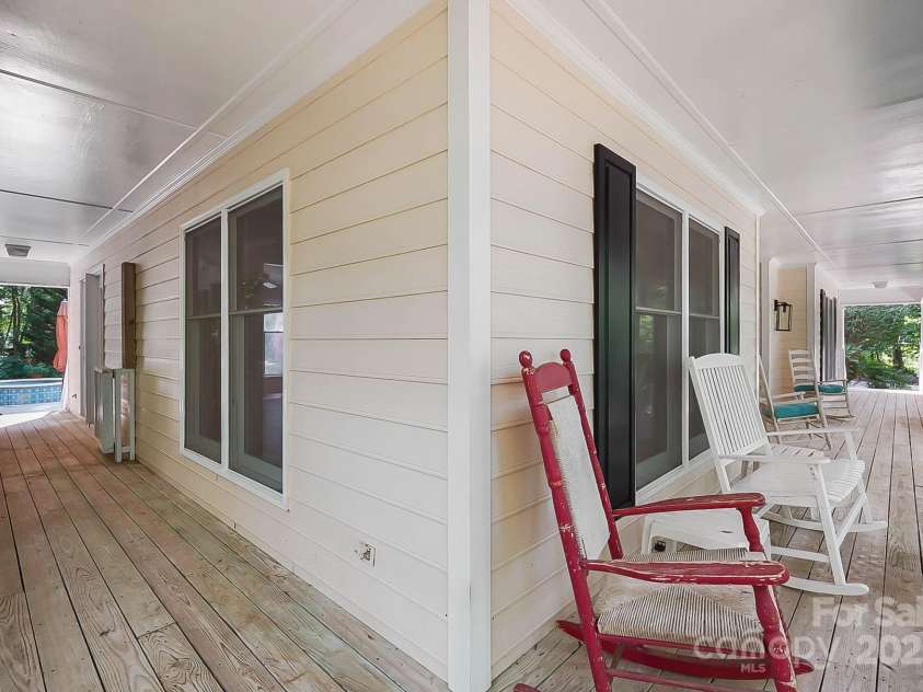 9921 Hanging Moss Trail, Mint Hill, NC 28227.  MLS# CAR4293455, YatesRealty ID 34217. Front porch wraps around to the backyard.