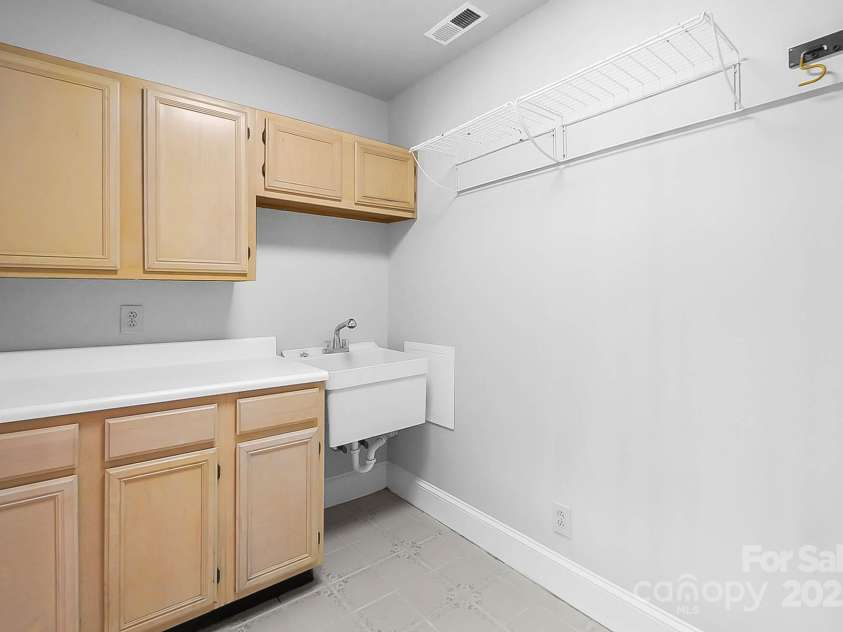 9921 Hanging Moss Trail, Mint Hill, NC 28227.  MLS# CAR4293455, YatesRealty ID 34217. Laundry room
